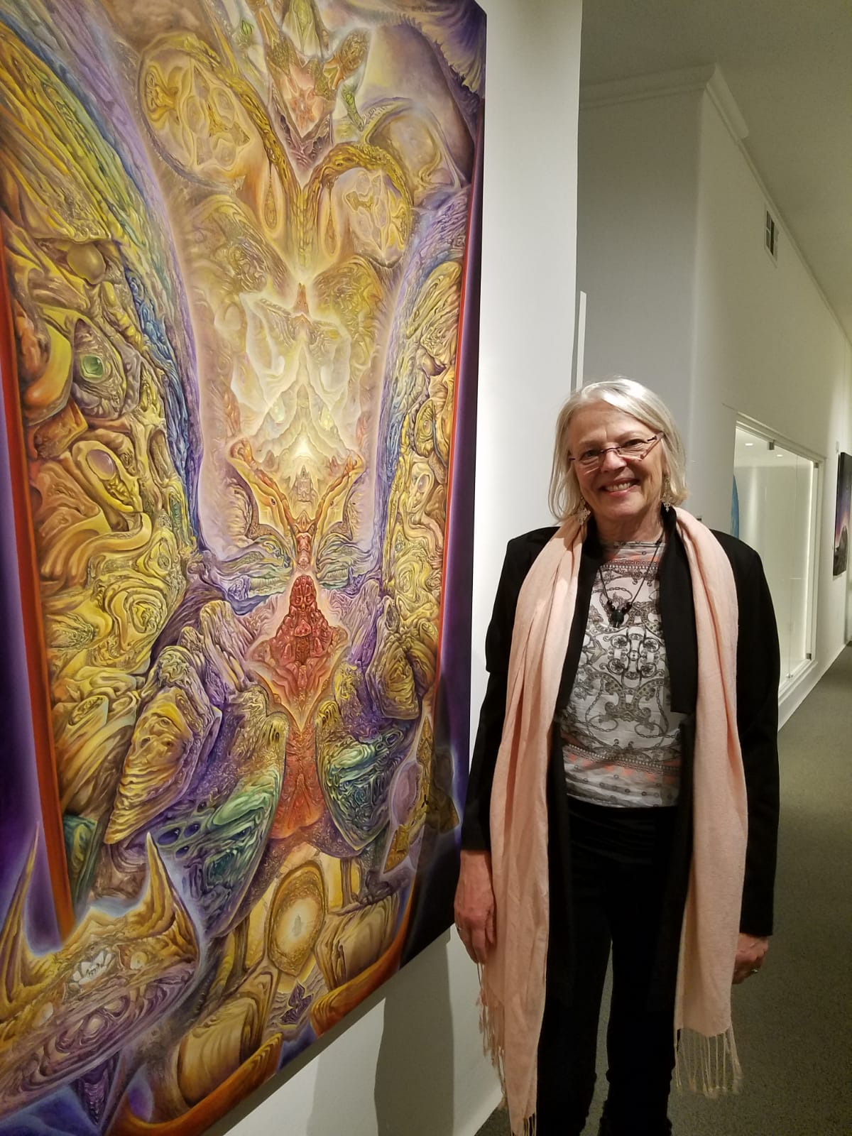 Deborah Parrish Snyder at the Secret Drugs of Buddhism book launch marvelling @phaneros_art's visionary gallery.